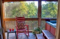 Rocking Chair beside the Hot Tub of this Pigeon Forge cabin rental